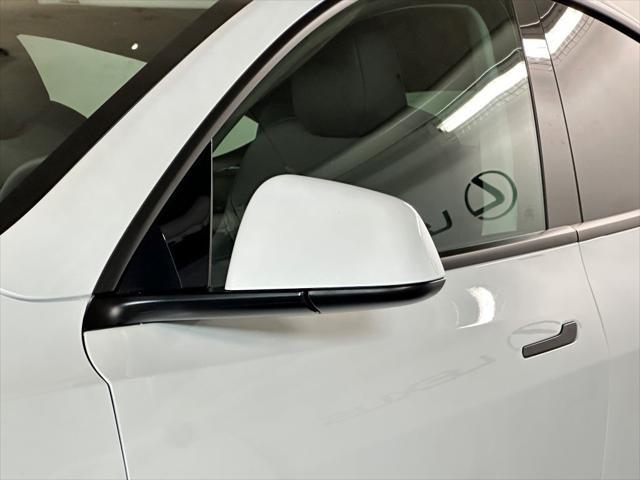 used 2025 Tesla Model Y car, priced at $38,897
