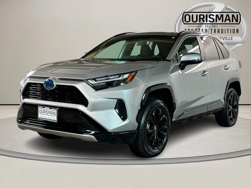 used 2024 Toyota RAV4 Hybrid car, priced at $34,997
