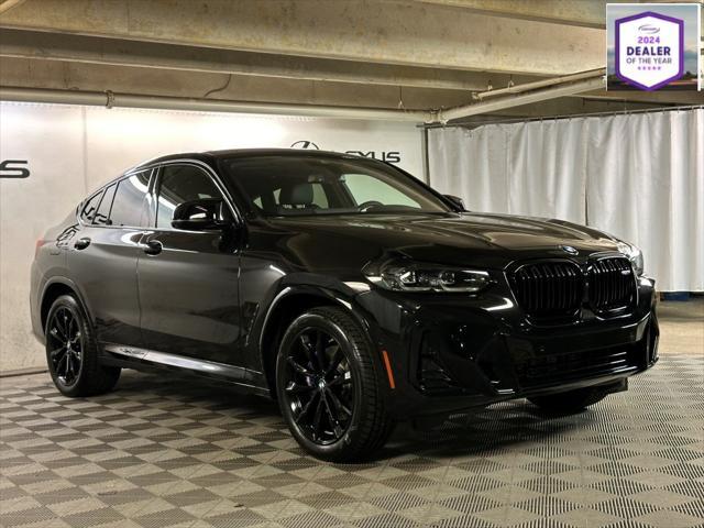 used 2025 BMW X4 car, priced at $68,997