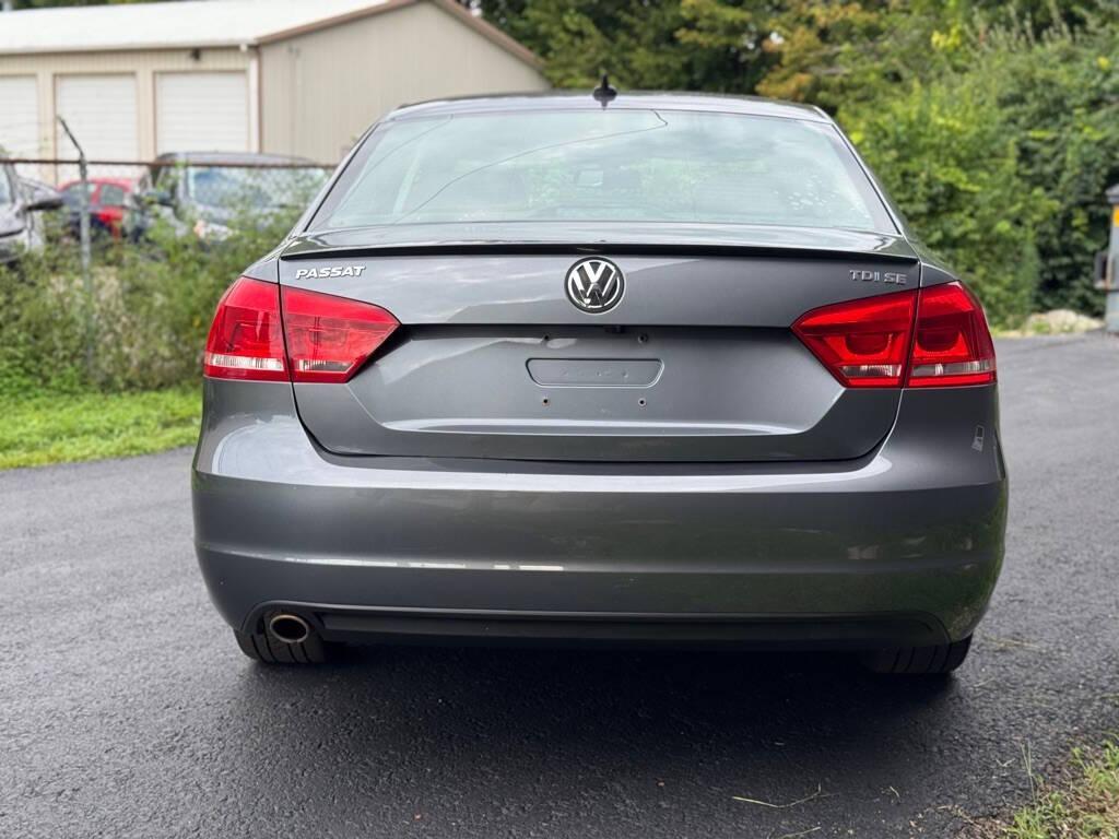 used 2014 Volkswagen Passat car, priced at $7,889