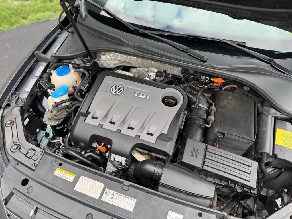 used 2014 Volkswagen Passat car, priced at $7,889