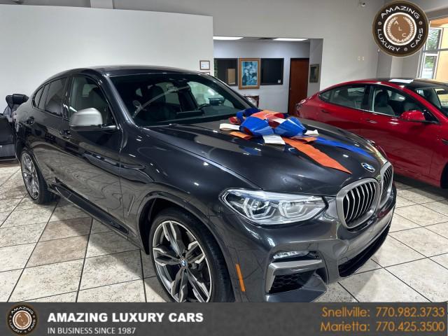 used 2021 BMW X4 car, priced at $38,999