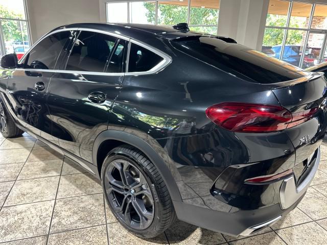 used 2023 BMW X6 car, priced at $62,599