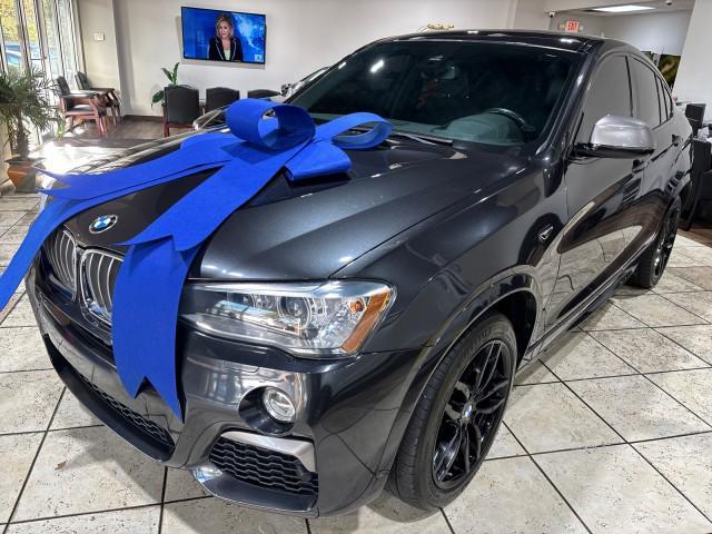 used 2018 BMW X4 car, priced at $24,999