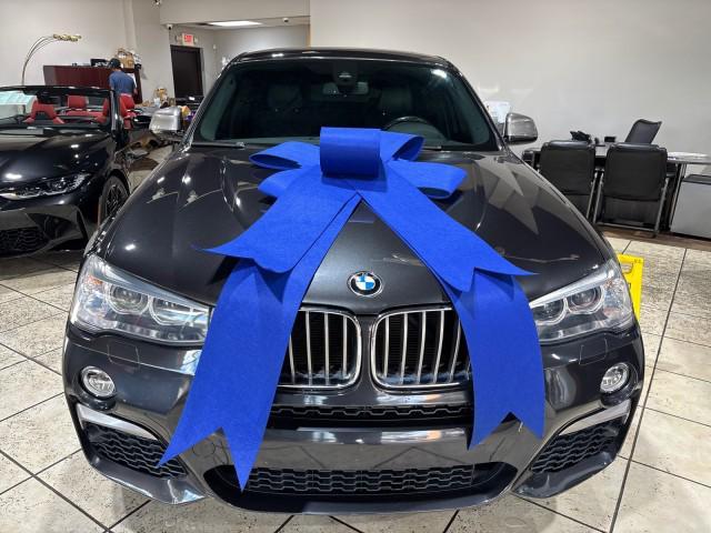 used 2018 BMW X4 car, priced at $24,999