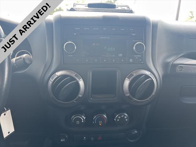 used 2011 Jeep Wrangler car, priced at $13,994