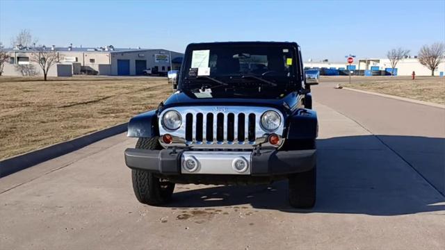 used 2012 Jeep Wrangler Unlimited car, priced at $17,999