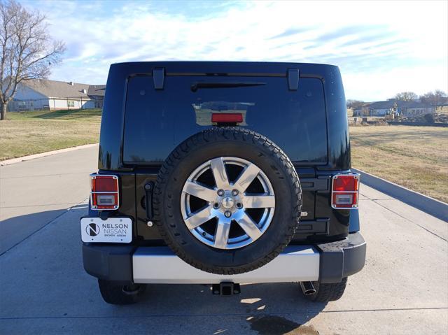 used 2012 Jeep Wrangler Unlimited car, priced at $17,999