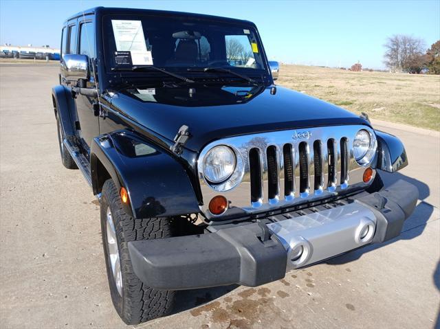 used 2012 Jeep Wrangler Unlimited car, priced at $17,999