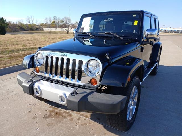 used 2012 Jeep Wrangler Unlimited car, priced at $17,999