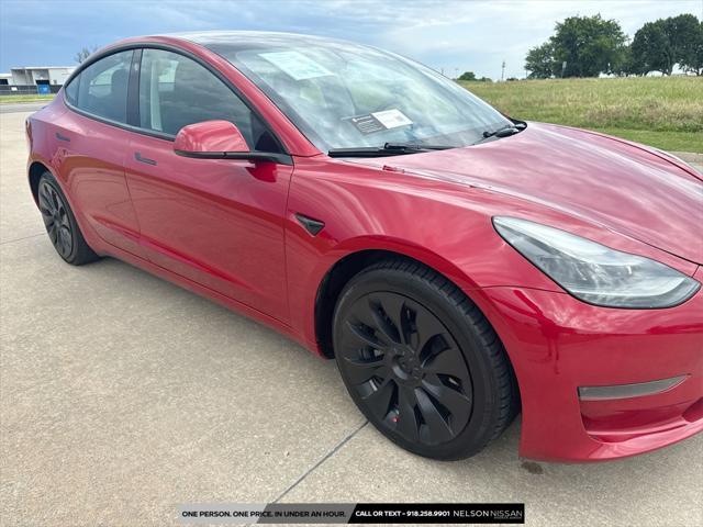 used 2023 Tesla Model 3 car, priced at $22,999
