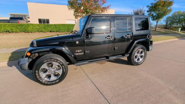 used 2016 Jeep Wrangler Unlimited car, priced at $23,991