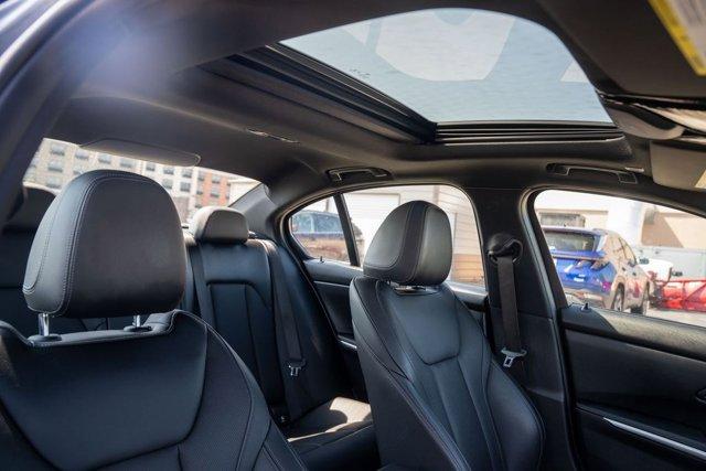 used 2023 BMW 330 car, priced at $37,590