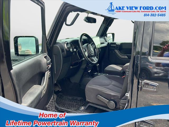 used 2015 Jeep Wrangler Unlimited car, priced at $18,795