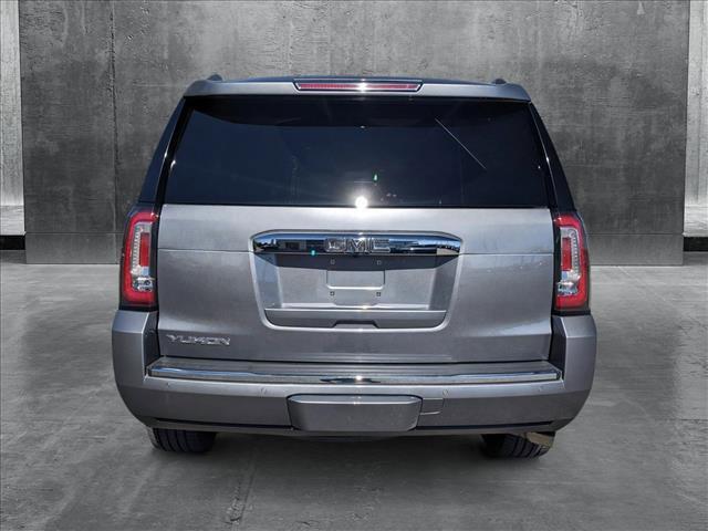 used 2019 GMC Yukon car, priced at $30,142