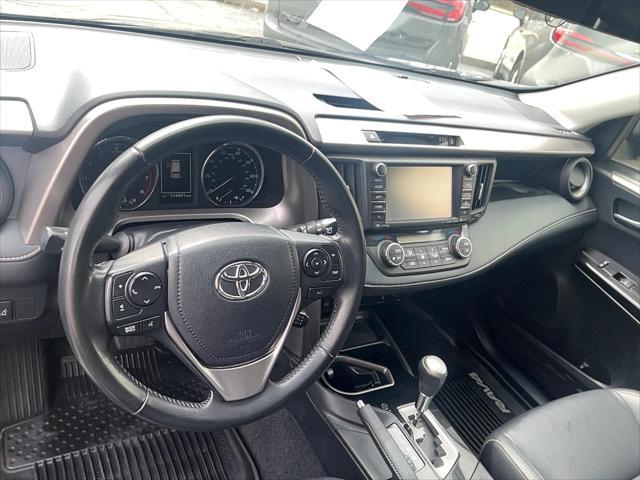 used 2018 Toyota RAV4 car, priced at $19,493