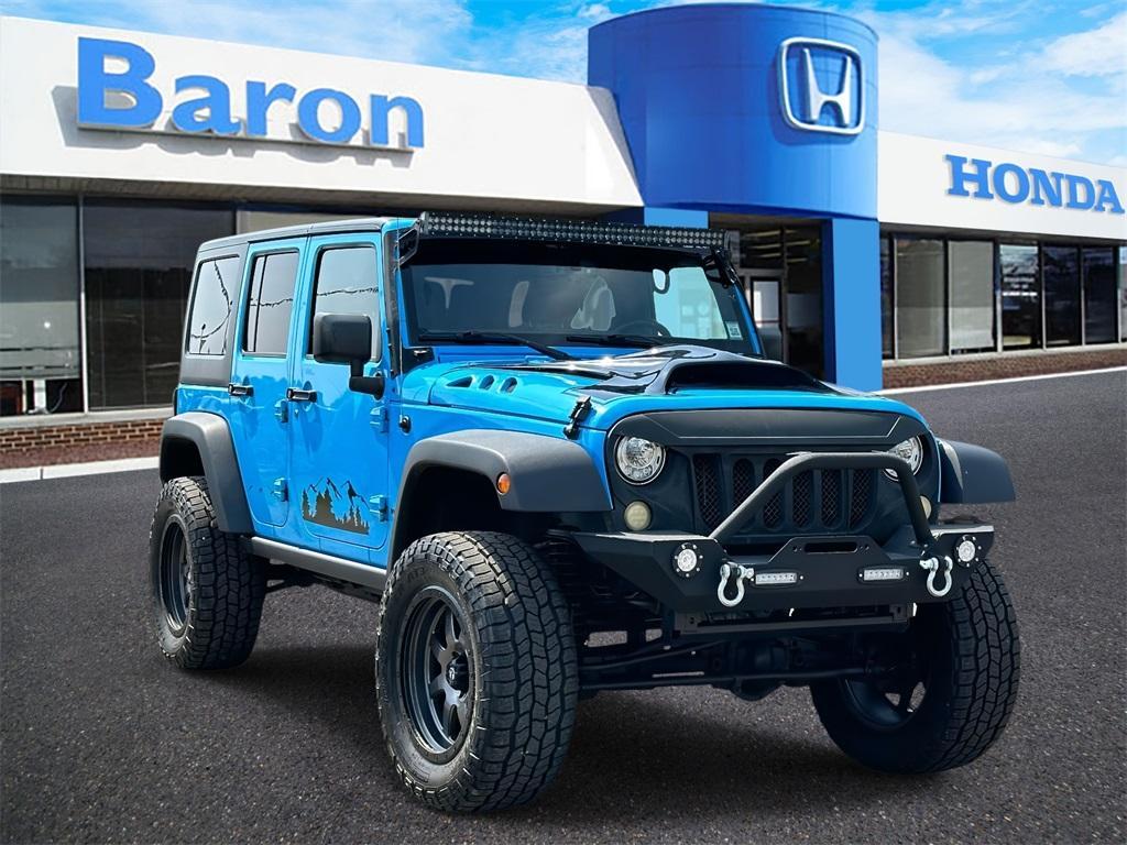 used 2017 Jeep Wrangler Unlimited car, priced at $23,645