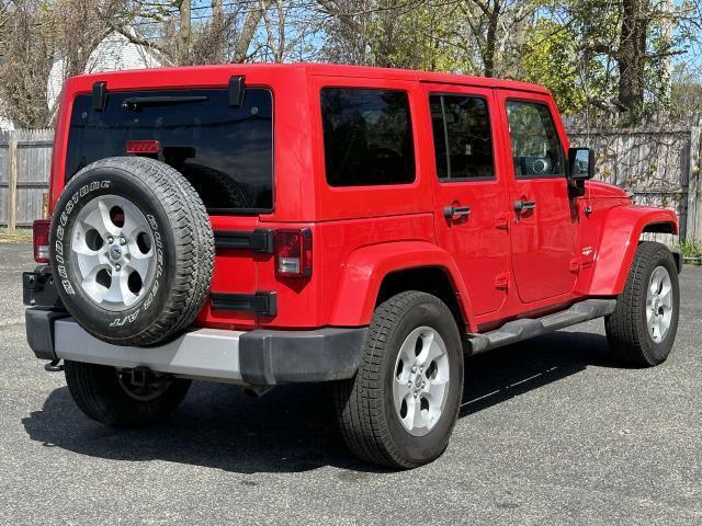 used 2014 Jeep Wrangler Unlimited car, priced at $20,159