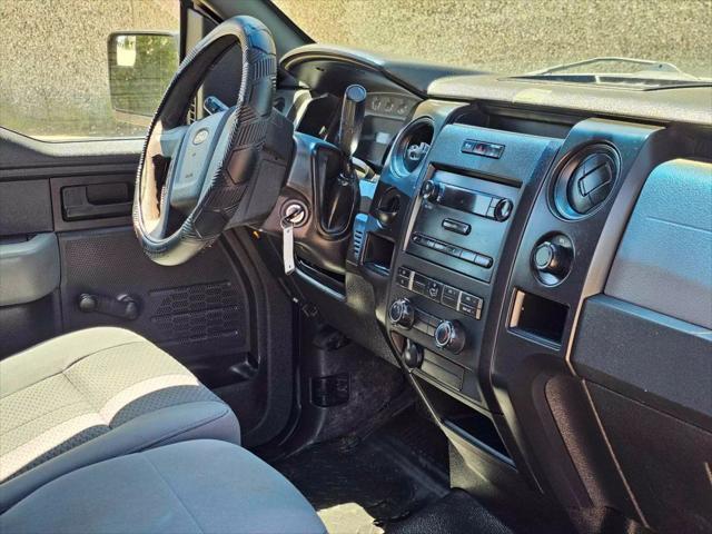 used 2014 Ford F-150 car, priced at $8,990