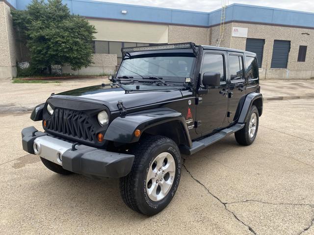 used 2013 Jeep Wrangler Unlimited car, priced at $13,990