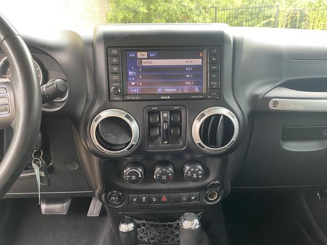 used 2013 Jeep Wrangler Unlimited car, priced at $13,990