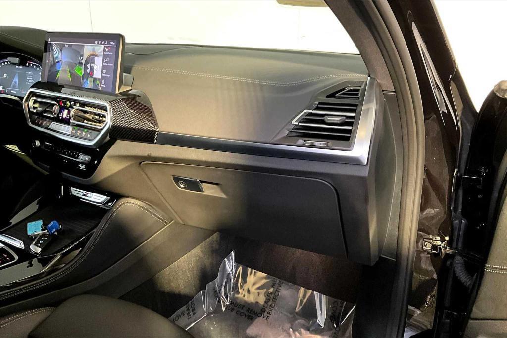 used 2023 BMW X4 M car, priced at $66,438