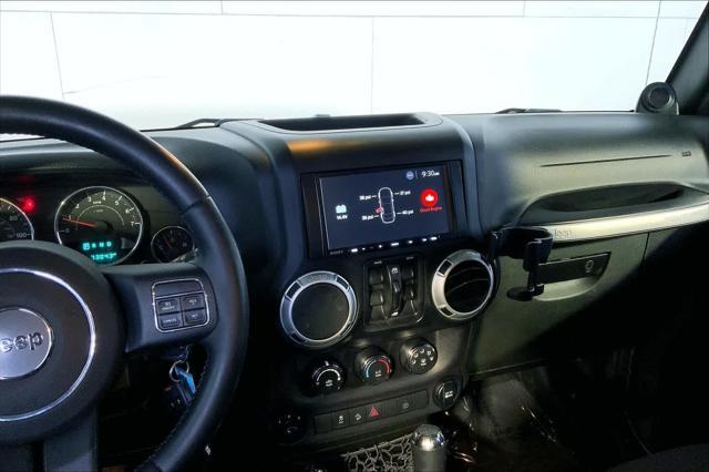 used 2014 Jeep Wrangler Unlimited car, priced at $21,245