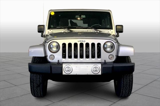 used 2014 Jeep Wrangler Unlimited car, priced at $21,245