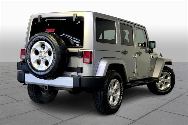 used 2014 Jeep Wrangler Unlimited car, priced at $21,245