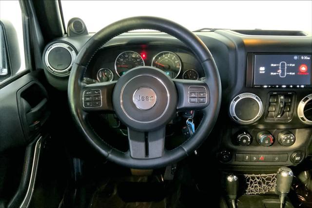 used 2014 Jeep Wrangler Unlimited car, priced at $21,245