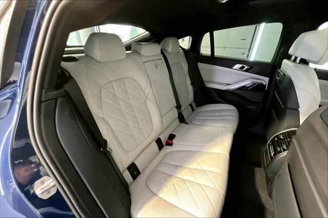 used 2023 BMW X6 car, priced at $60,971