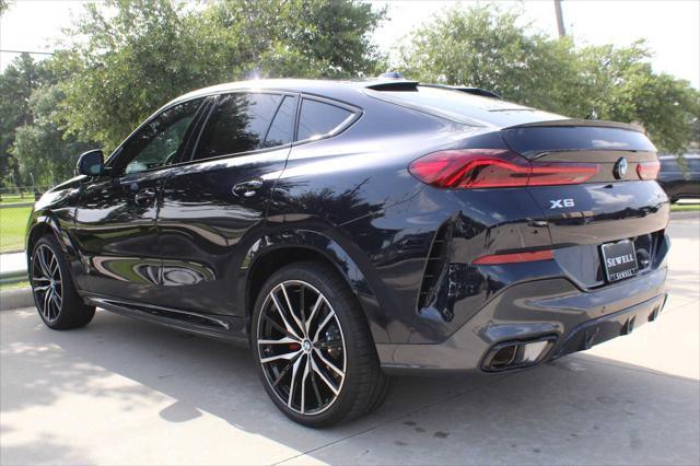 used 2025 BMW X6 car, priced at $76,981