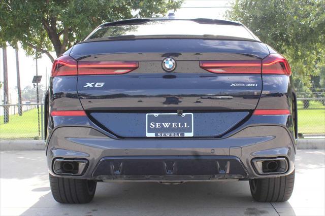 used 2025 BMW X6 car, priced at $76,981