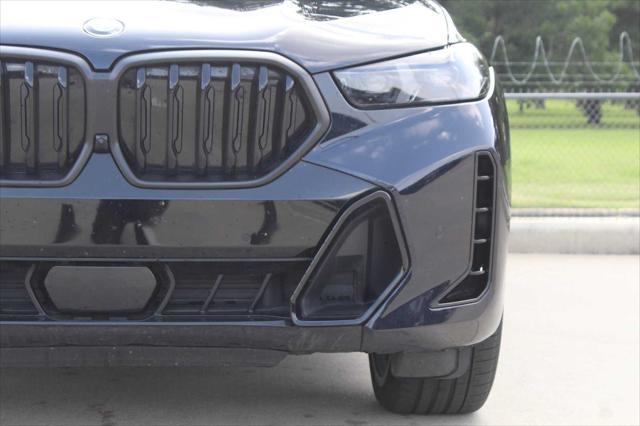 used 2025 BMW X6 car, priced at $76,981