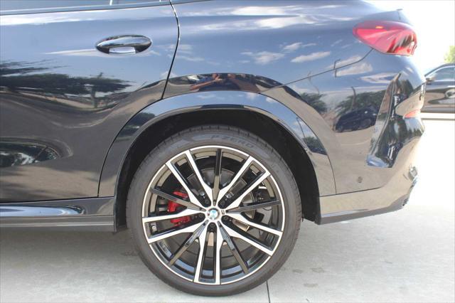 used 2025 BMW X6 car, priced at $76,981