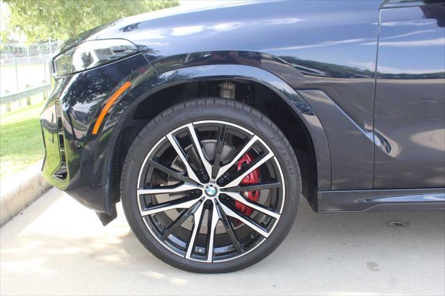 used 2025 BMW X6 car, priced at $76,981