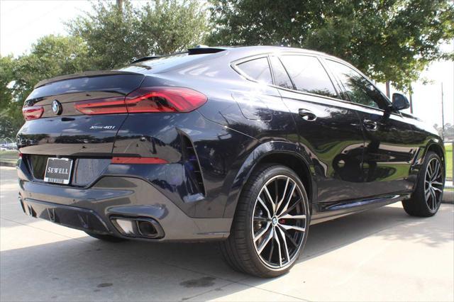 used 2025 BMW X6 car, priced at $76,981