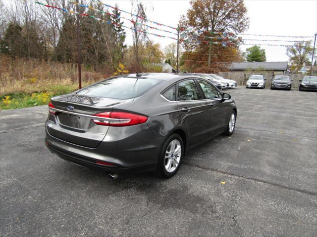 used 2018 Ford Fusion car, priced at $12,499