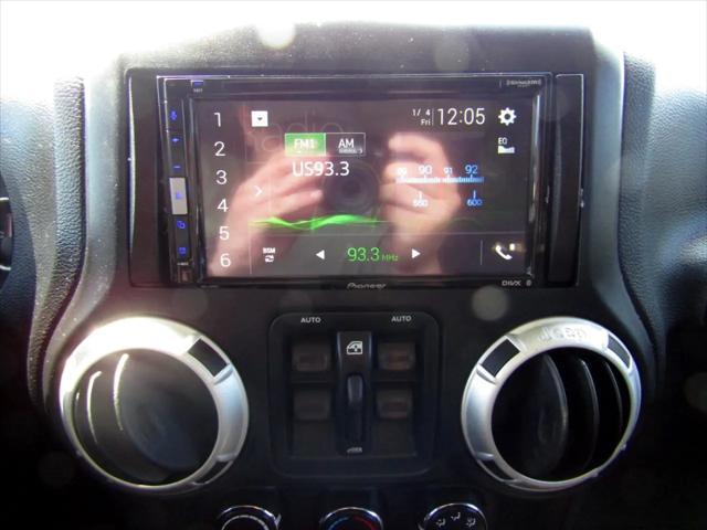 used 2013 Jeep Wrangler Unlimited car, priced at $14,499