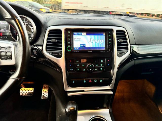 used 2013 Jeep Grand Cherokee car, priced at $23,999