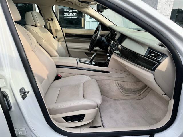 used 2011 BMW 750 car, priced at $11,999