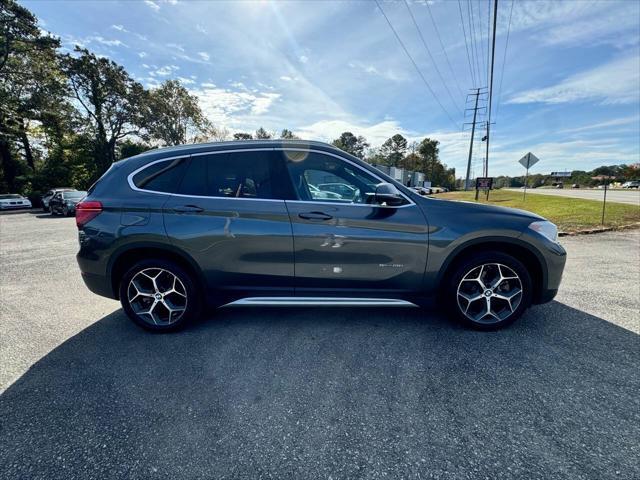 used 2018 BMW X1 car, priced at $14,999