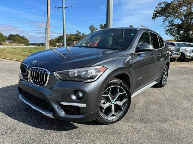 used 2018 BMW X1 car, priced at $14,999