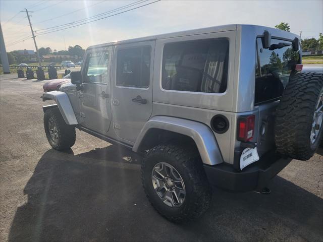 used 2015 Jeep Wrangler Unlimited car, priced at $19,999