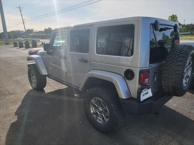 used 2015 Jeep Wrangler Unlimited car, priced at $19,999