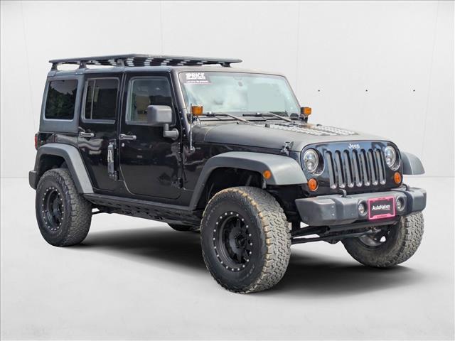 used 2012 Jeep Wrangler Unlimited car, priced at $16,509
