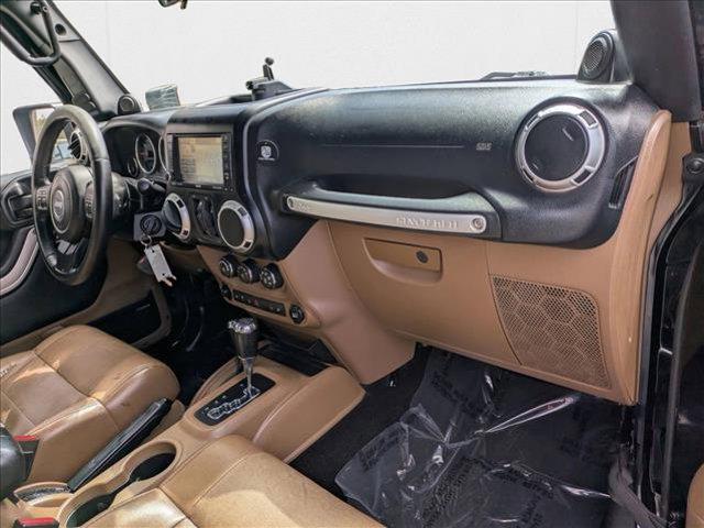used 2012 Jeep Wrangler Unlimited car, priced at $16,509