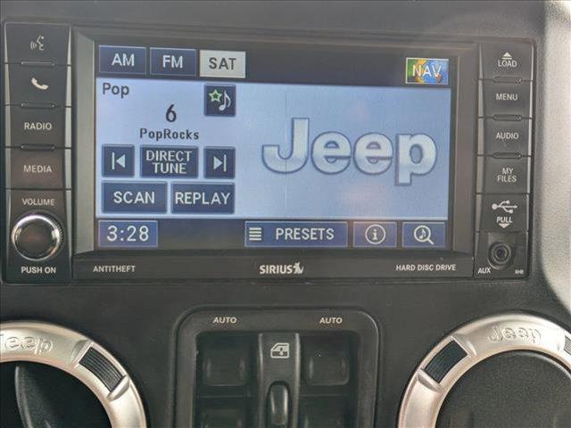used 2012 Jeep Wrangler Unlimited car, priced at $16,509