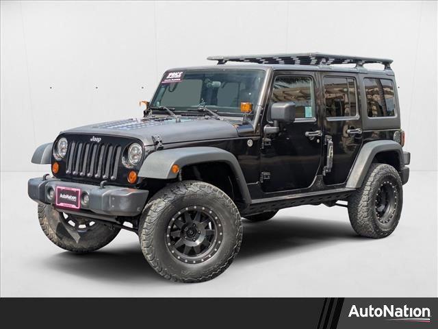 used 2012 Jeep Wrangler Unlimited car, priced at $16,509