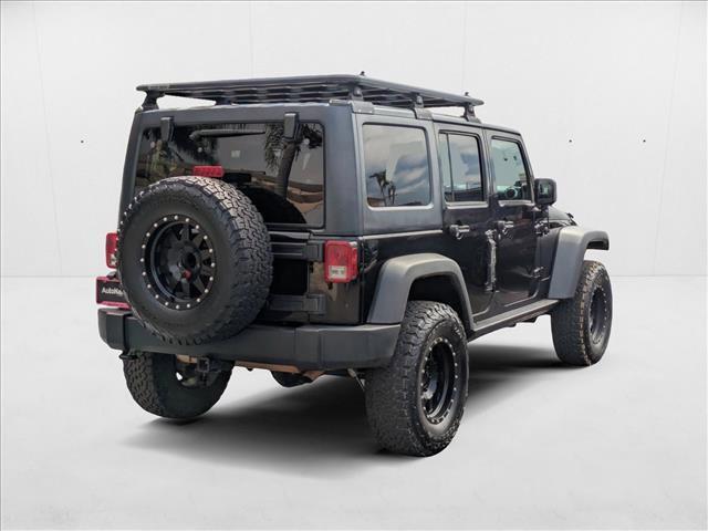 used 2012 Jeep Wrangler Unlimited car, priced at $16,509